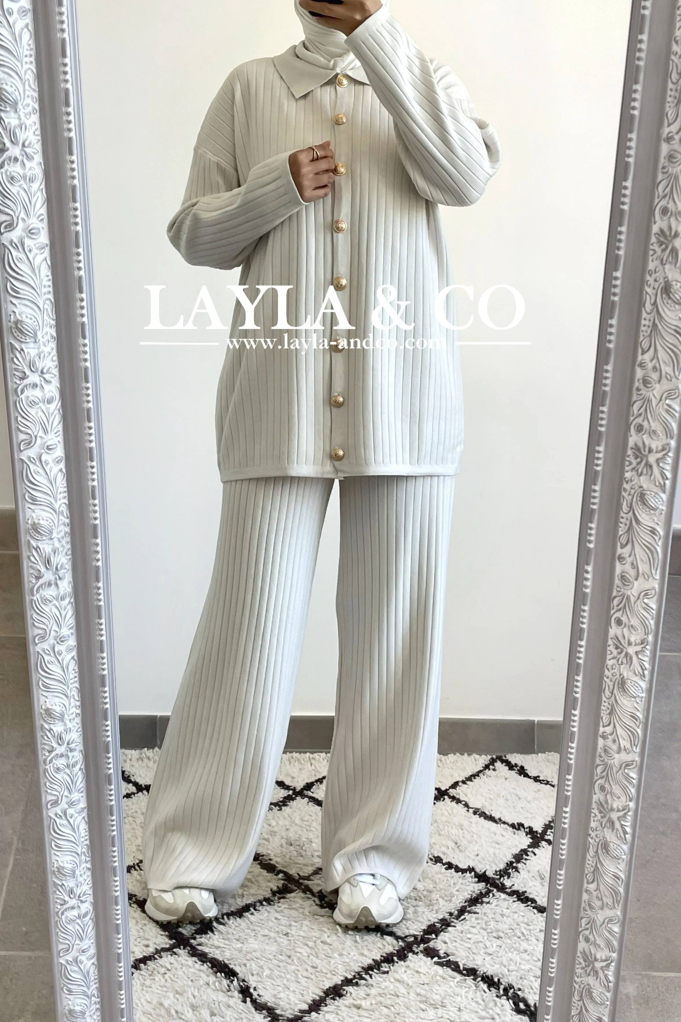 Ensemble pull à boutons