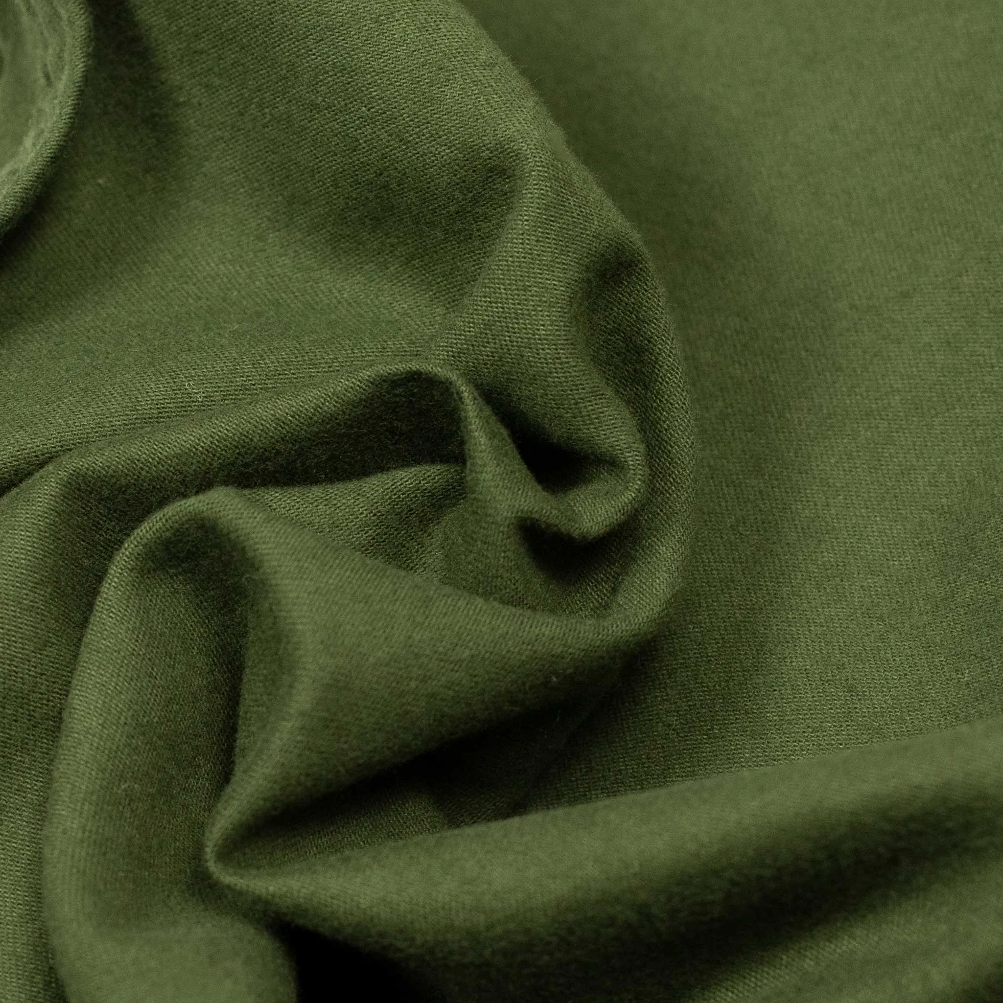 Pleated trousers in green lightweight moleskin