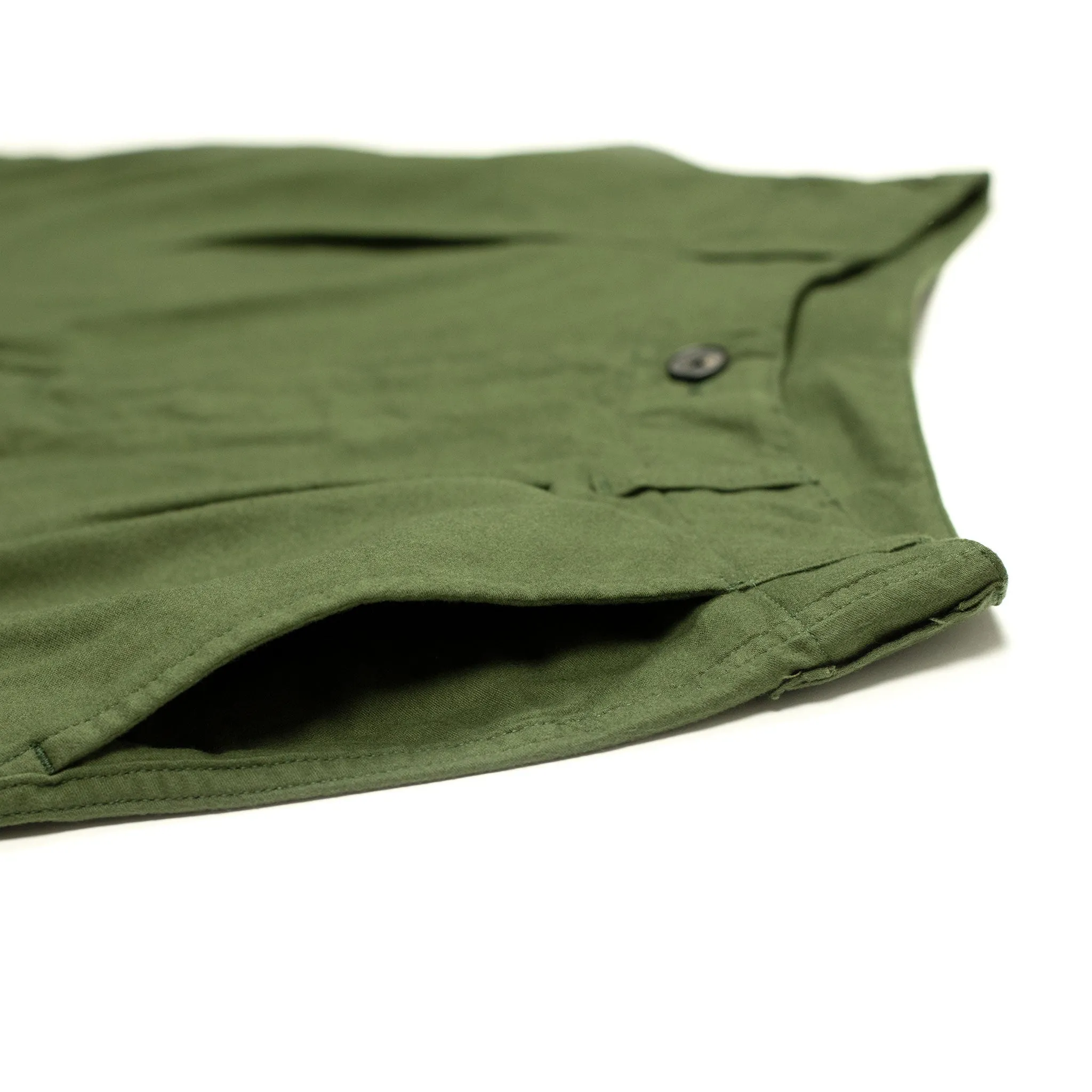 Pleated trousers in green lightweight moleskin