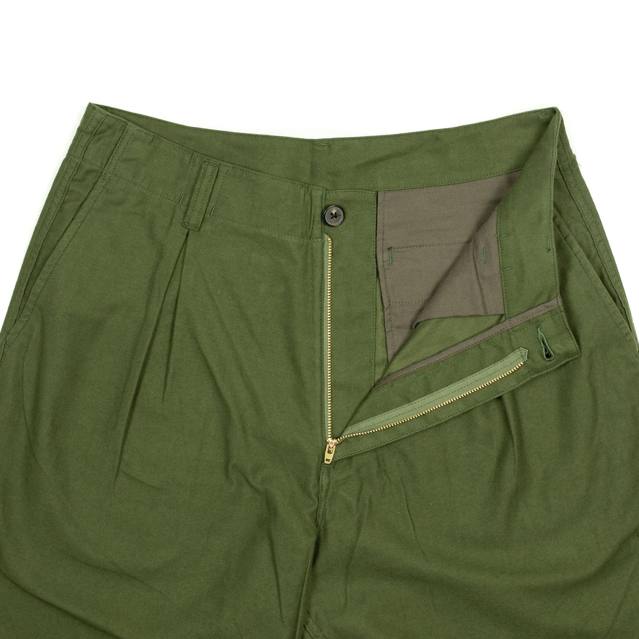 Pleated trousers in green lightweight moleskin