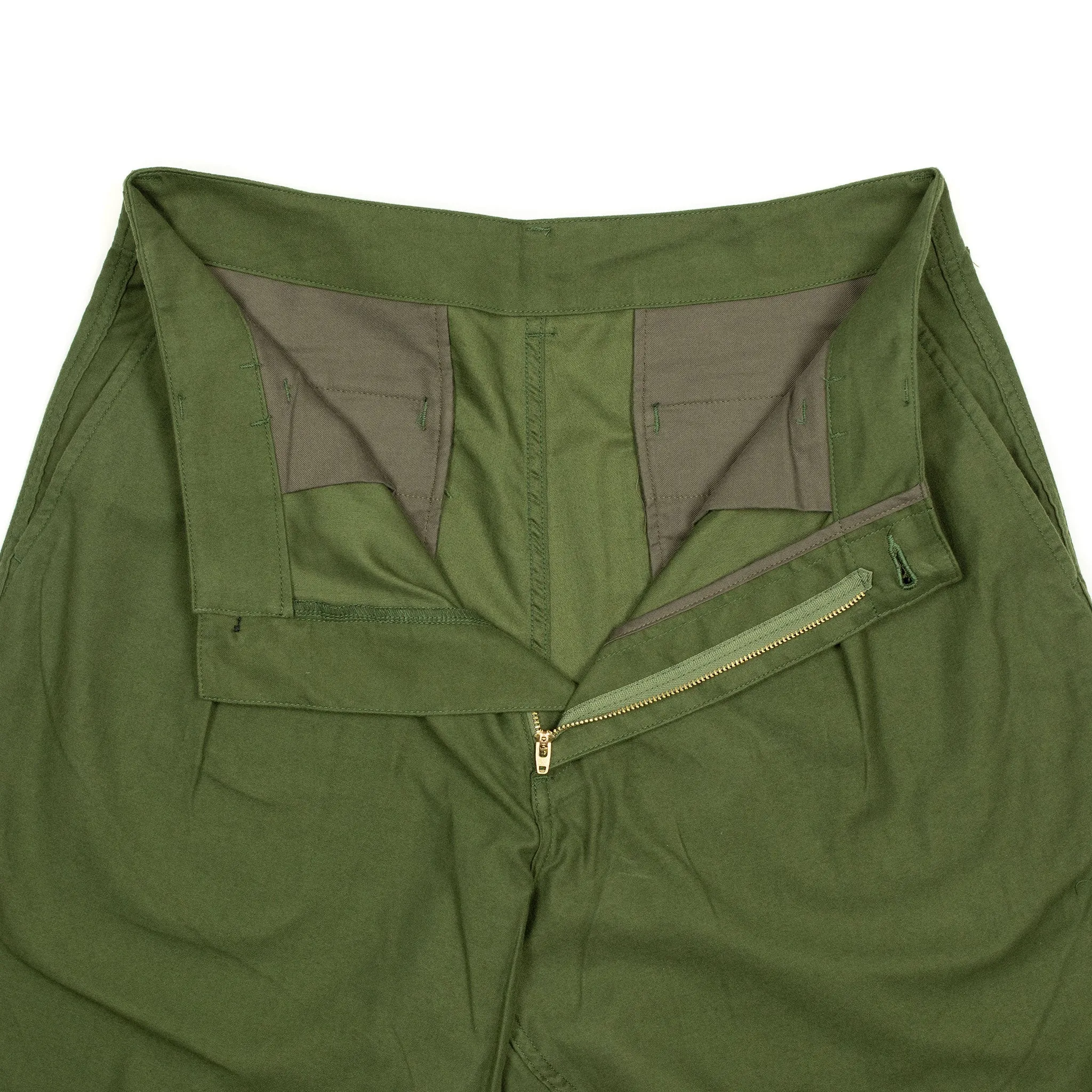 Pleated trousers in green lightweight moleskin